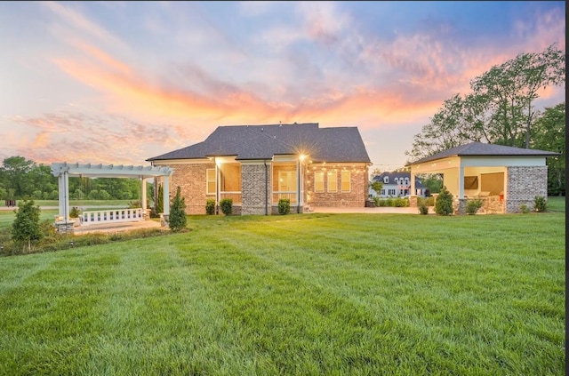 8119 Schweitzer Pl, Arrington, TN 37014 - view of front of property with brick siding, a front lawn, and a pergola