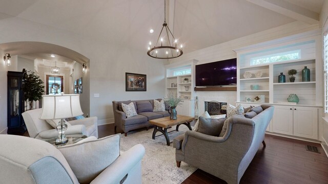 8119 Schweitzer Pl, Arrington, TN 37014 - living room with visible vents, dark wood-style flooring, baseboards, lofted ceiling with beams, and arched walkways