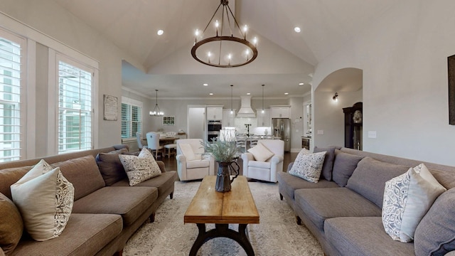 8119 Schweitzer Pl, Arrington, TN 37014 - living room featuring an inviting chandelier, recessed lighting, and arched walkways