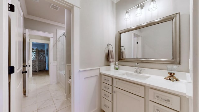 8119 Schweitzer Pl, Arrington, TN 37014 - bathroom with vanity, ornamental molding, marble finish floor, and visible vents