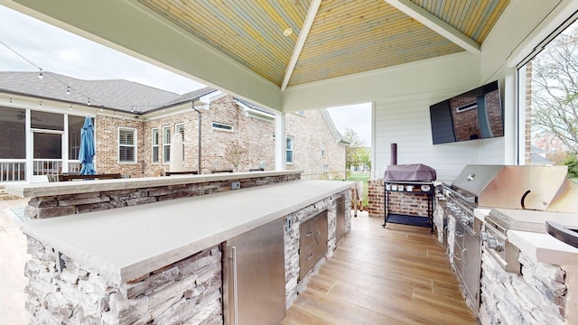 8119 Schweitzer Pl, Arrington, TN 37014 - view of patio with exterior kitchen and grilling area