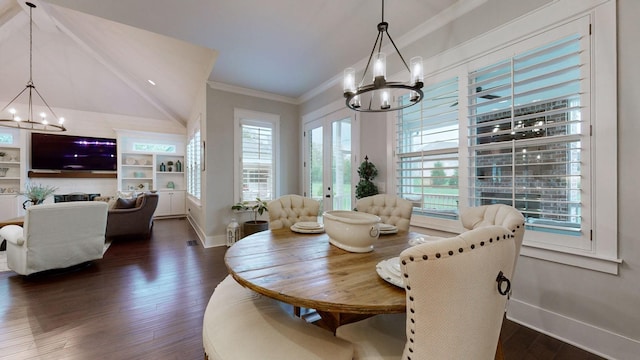 8119 Schweitzer Pl, Arrington, TN 37014 - dining room featuring baseboards, ornamental molding, dark wood-type flooring, and a notable chandelier