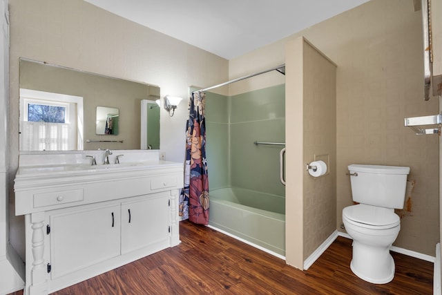 207 Dunlap St, Paris, TN 38242 - bathroom with vanity, toilet, wood finished floors, and shower / bath combination with curtain