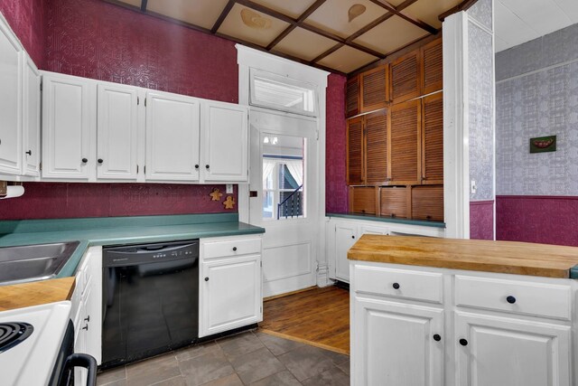 207 Dunlap St, Paris, TN 38242 - kitchen with white cabinetry, a sink, black dishwasher, wallpapered walls, and butcher block countertops
