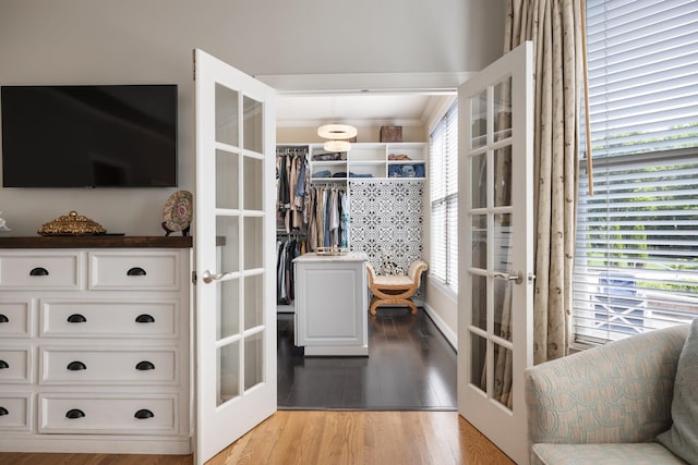 interior space featuring french doors and light wood finished floors