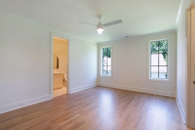 111 Keyway Dr, Nashville, TN 37205 - empty room with ornamental molding, wood finished floors, a ceiling fan, and baseboards