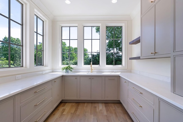 111 Keyway Dr, Nashville, TN 37205 - kitchen featuring a sink, light wood-style flooring, open shelves, recessed lighting, and light stone counters