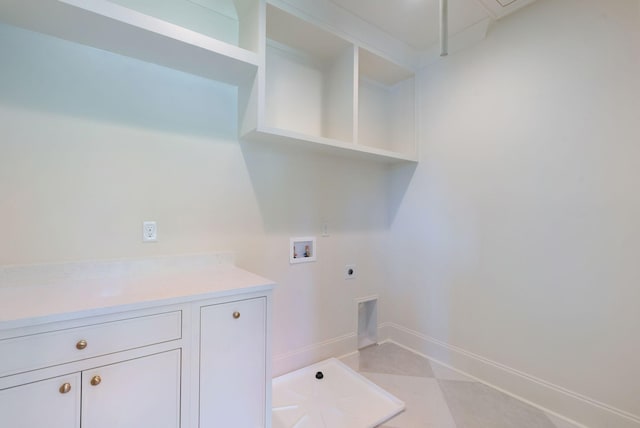 111 Keyway Dr, Nashville, TN 37205 - clothes washing area featuring electric dryer hookup, washer hookup, baseboards, and cabinet space