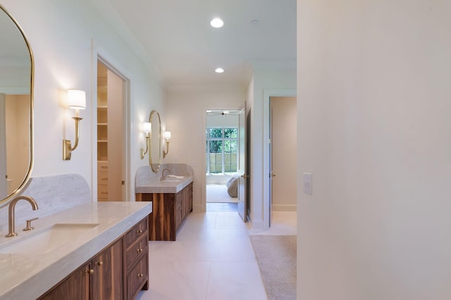 111 Keyway Dr, Nashville, TN 37205 - bathroom featuring two vanities, recessed lighting, crown molding, and connected bathroom