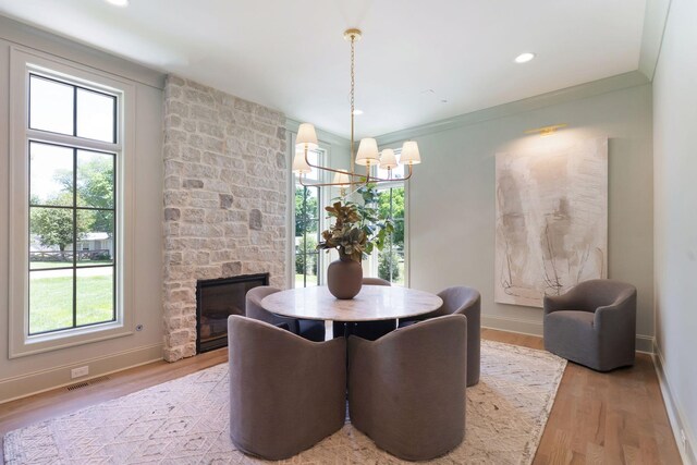 111 Keyway Dr, Nashville, TN 37205 - dining space featuring a chandelier, baseboards, and light wood-style flooring