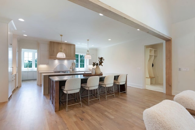 111 Keyway Dr, Nashville, TN 37205 - kitchen featuring a spacious island, healthy amount of natural light, light wood-style flooring, light countertops, and recessed lighting