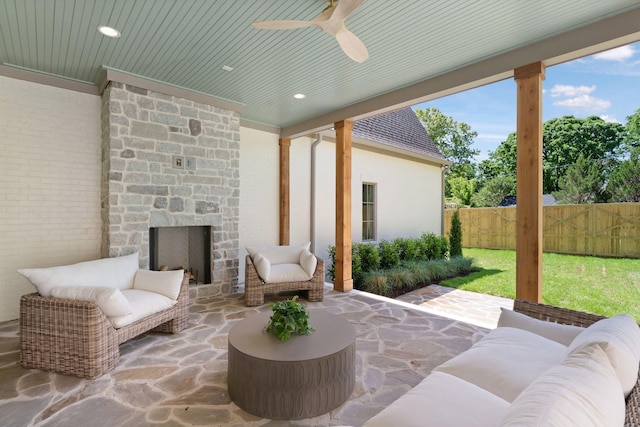 111 Keyway Dr, Nashville, TN 37205 - view of patio with fence, a ceiling fan, and an outdoor living space with a fireplace