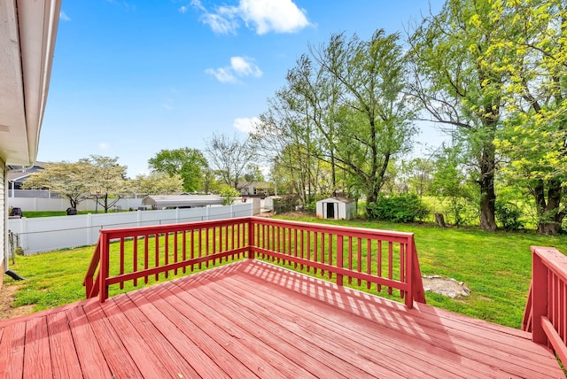 3404 Albert Dr, Clarksville, TN 37042 - deck featuring a lawn, a storage unit, an outdoor structure, and a fenced backyard