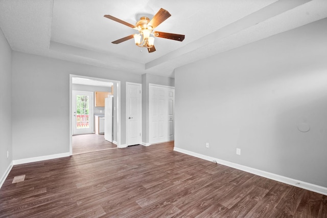 3404 Albert Dr, Clarksville, TN 37042 - spare room with baseboards, a raised ceiling, ceiling fan, and wood finished floors