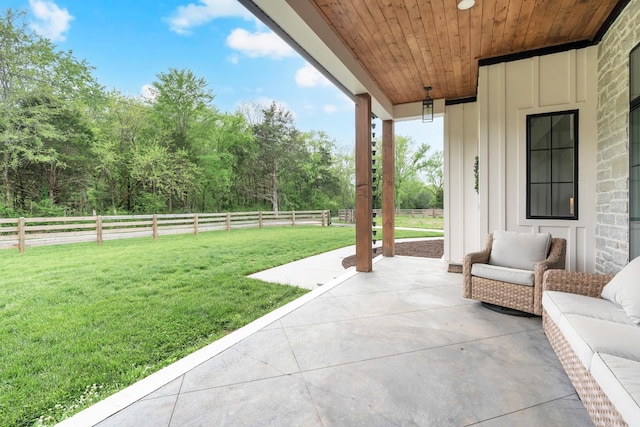 view of patio / terrace featuring a fenced backyard and an outdoor living space