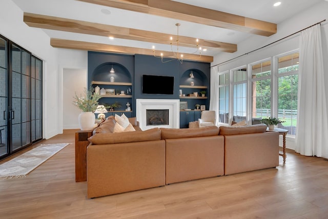 living room with recessed lighting, beamed ceiling, light wood-style flooring, and a fireplace