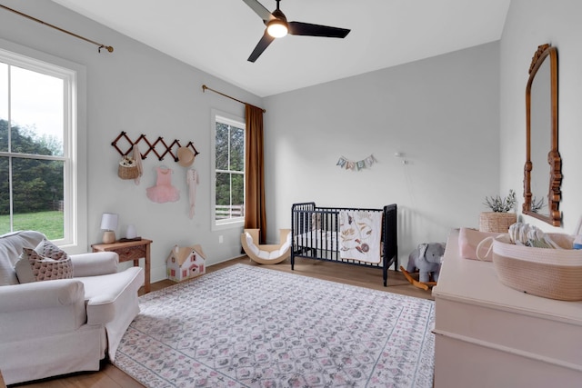 bedroom featuring ceiling fan and wood finished floors