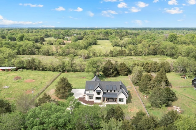 bird's eye view featuring a view of trees