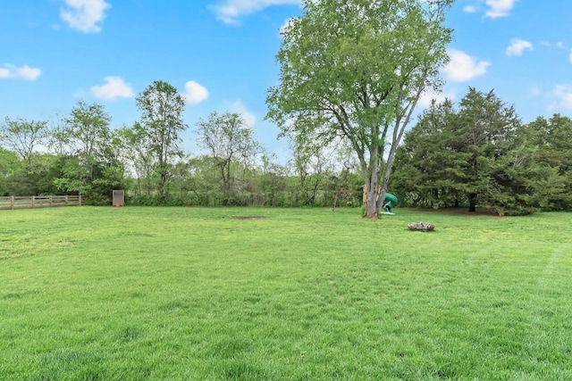 view of yard with fence
