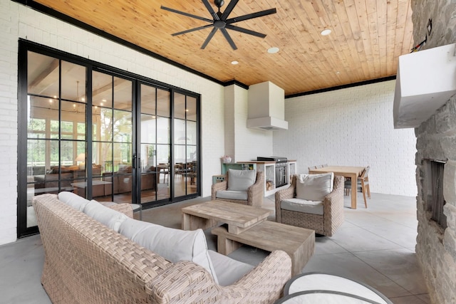 view of patio / terrace with ceiling fan, area for grilling, and outdoor lounge area