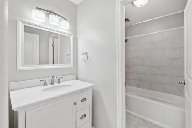 full bath featuring vanity and shower / bathtub combination