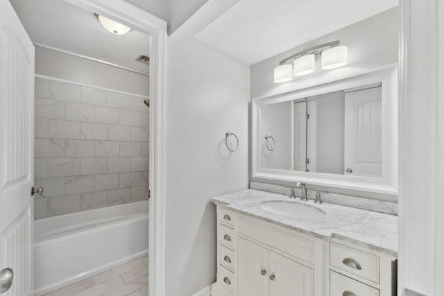 bathroom featuring vanity and bathing tub / shower combination