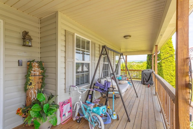 wooden deck with a porch