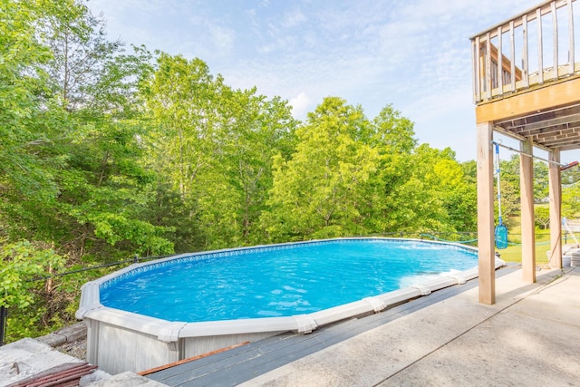 outdoor pool featuring a patio area