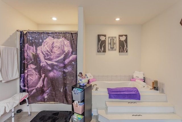 bathroom featuring a garden tub, recessed lighting, and a shower with shower curtain