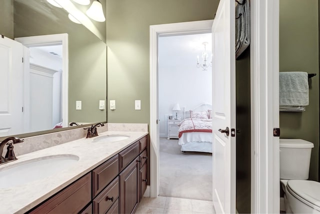 5028 Rockport Ave, Franklin, TN 37064 - ensuite bathroom featuring a sink, toilet, double vanity, and connected bathroom