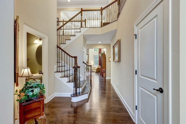 5028 Rockport Ave, Franklin, TN 37064 - foyer with baseboards, stairs, dark wood-style flooring, and a high ceiling