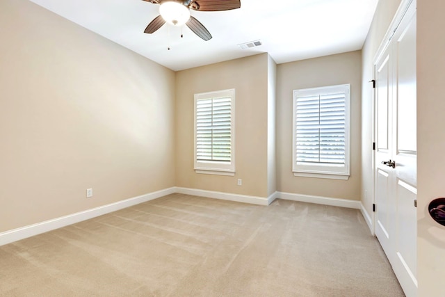 5028 Rockport Ave, Franklin, TN 37064 - unfurnished room featuring ceiling fan, visible vents, light carpet, and baseboards