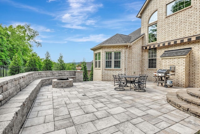 5028 Rockport Ave, Franklin, TN 37064 - view of patio / terrace featuring a fire pit, fence, and a grill