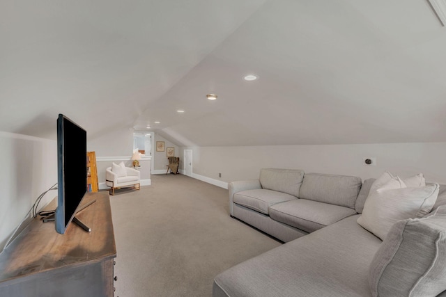 carpeted living area featuring baseboards, vaulted ceiling, and recessed lighting
