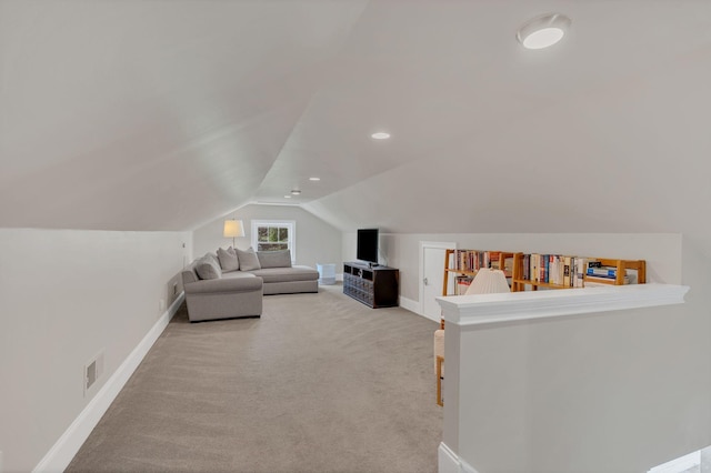 interior space with visible vents, lofted ceiling, baseboards, recessed lighting, and carpet flooring