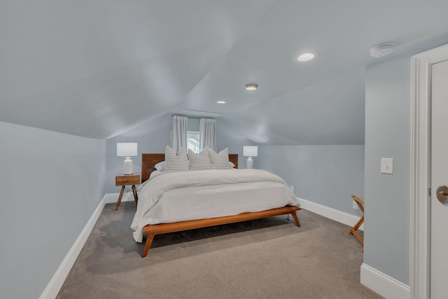 carpeted bedroom featuring recessed lighting, baseboards, and vaulted ceiling