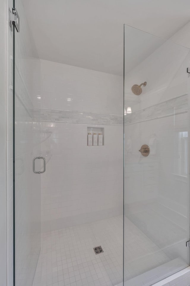 bathroom with a stall shower