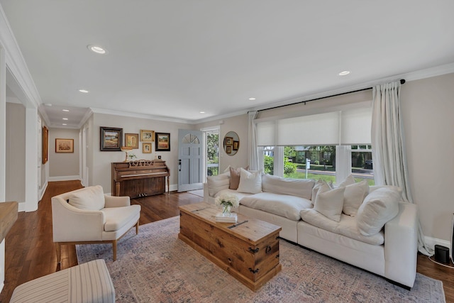 living area with recessed lighting, ornamental molding, baseboards, and wood finished floors
