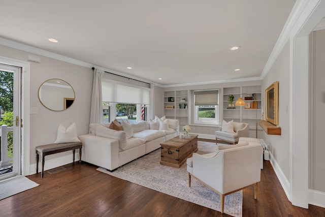 living room with baseboards, dark wood-style floors, plenty of natural light, and ornamental molding