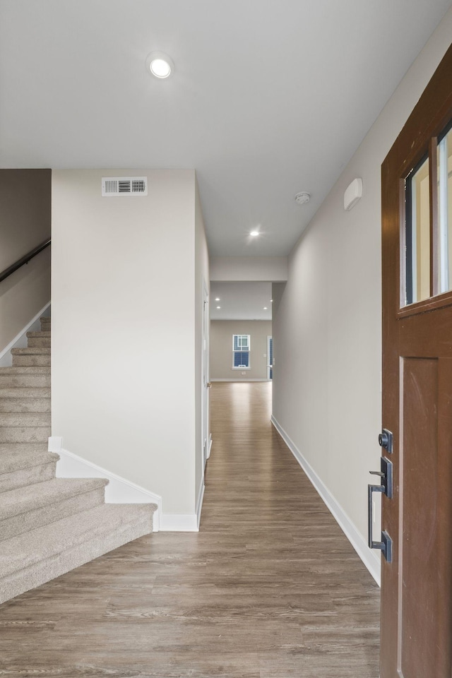 258 Dartmoor Pl, Goodlettsville, TN 37072 - foyer with baseboards, stairs, wood finished floors, and visible vents