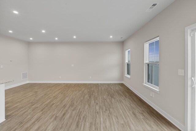 258 Dartmoor Pl, Goodlettsville, TN 37072 - spare room with baseboards, visible vents, and light wood-style floors