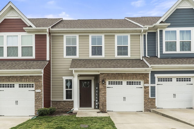 258 Dartmoor Pl, Goodlettsville, TN 37072 - multi unit property with driveway, a shingled roof, stone siding, and a garage