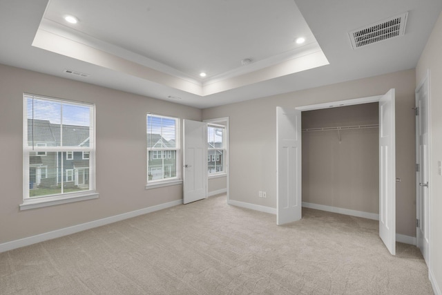 258 Dartmoor Pl, Goodlettsville, TN 37072 - unfurnished bedroom with multiple windows, light carpet, and visible vents