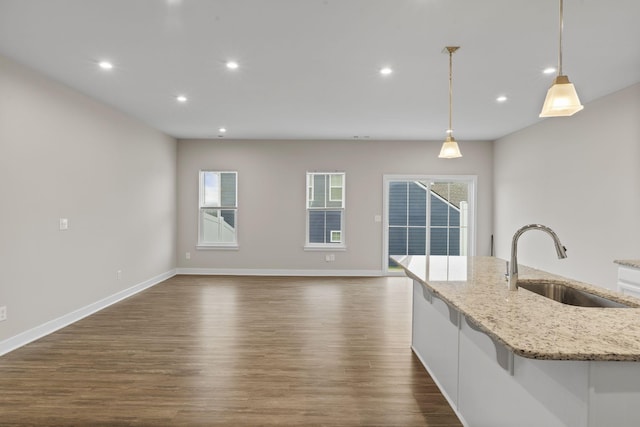 258 Dartmoor Pl, Goodlettsville, TN 37072 - kitchen with plenty of natural light, a sink, an island with sink, and dark wood-style floors