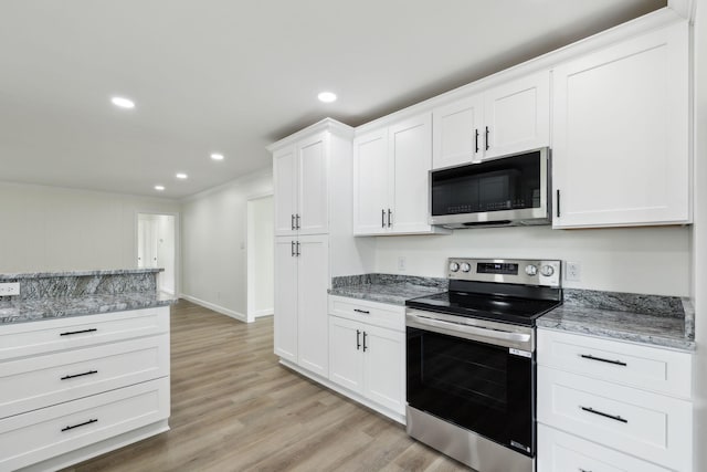 208 Linger Ln, Lebanon, TN 37087 - kitchen featuring appliances with stainless steel finishes, recessed lighting, ornamental molding, white cabinetry, and light wood-style floors