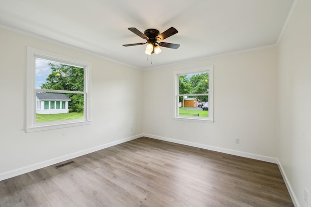 208 Linger Ln, Lebanon, TN 37087 - unfurnished room with crown molding, wood finished floors, baseboards, and ceiling fan