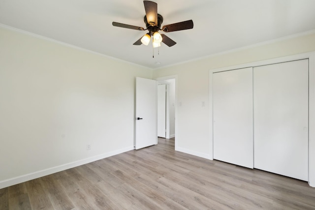 208 Linger Ln, Lebanon, TN 37087 - unfurnished bedroom with ornamental molding, light wood-style floors, baseboards, a closet, and a ceiling fan