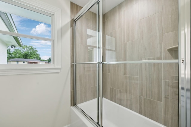 208 Linger Ln, Lebanon, TN 37087 - bathroom featuring bath / shower combo with glass door