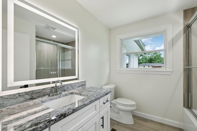 208 Linger Ln, Lebanon, TN 37087 - bathroom featuring a shower with shower door, vanity, baseboards, toilet, and wood finished floors