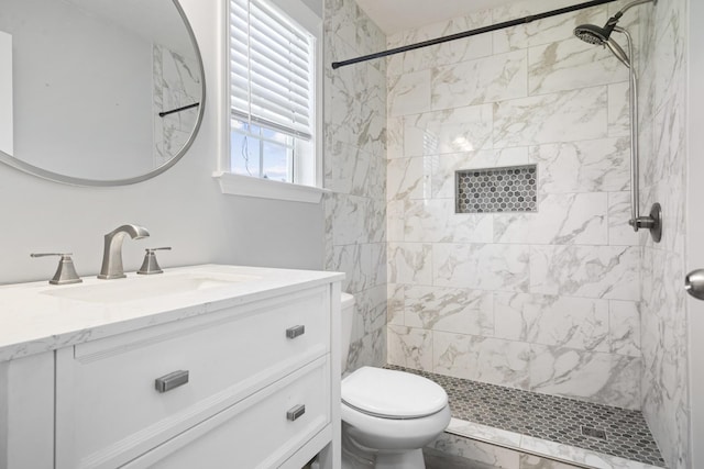 6241 Eskew Dr, Columbia, TN 38401 - bathroom featuring vanity, toilet, and a tile shower